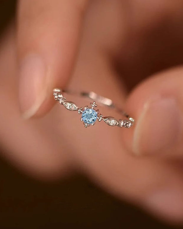 ブルーストーン オープンリング レディース 指輪 フリーサイズ 調整可能 シンプル 雪の結晶デザイン 高級感 ID1578